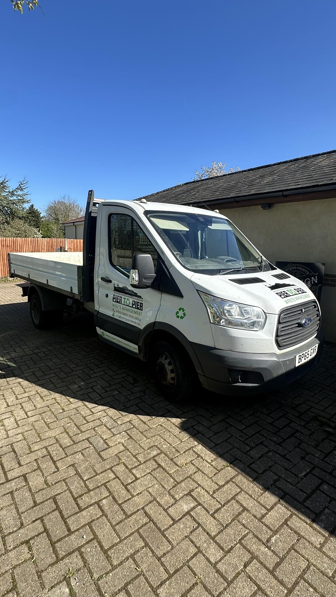 Loaded clearance van outside a Brighton property